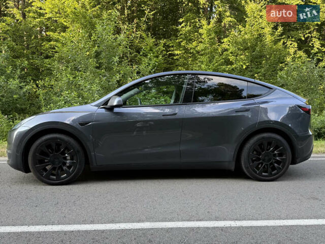 Серый Тесла Model Y, объемом двигателя 0 л и пробегом 61 тыс. км за 23200 $, фото 2 на Automoto.ua