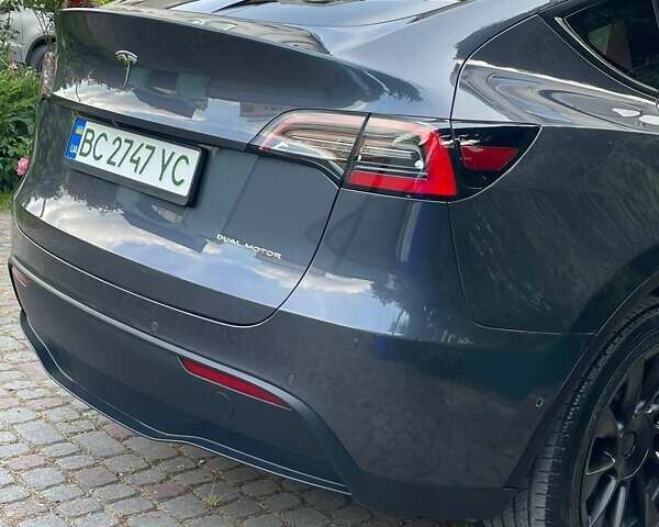 Серый Тесла Model Y, объемом двигателя 0 л и пробегом 83 тыс. км за 21499 $, фото 13 на Automoto.ua