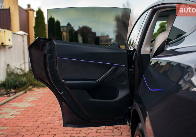 Сірий Тесла Model Y, об'ємом двигуна 0 л та пробігом 75 тис. км за 26499 $, фото 25 на Automoto.ua