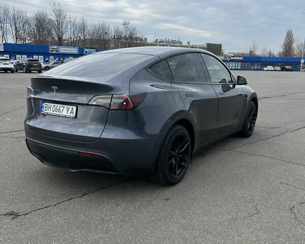 Серый Тесла Model Y, объемом двигателя 0 л и пробегом 99 тыс. км за 22300 $, фото 6 на Automoto.ua