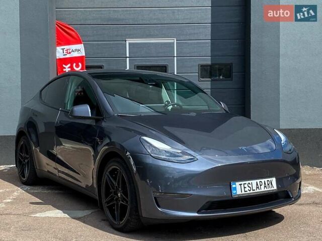 Серый Тесла Model Y, объемом двигателя 0 л и пробегом 123 тыс. км за 23999 $, фото 11 на Automoto.ua
