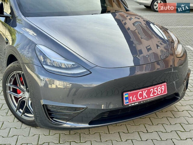 Серый Тесла Model Y, объемом двигателя 0 л и пробегом 100 тыс. км за 23000 $, фото 11 на Automoto.ua