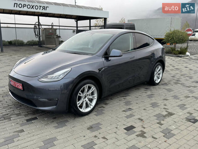 Серый Тесла Model Y, объемом двигателя 0 л и пробегом 128 тыс. км за 20300 $, фото 1 на Automoto.ua
