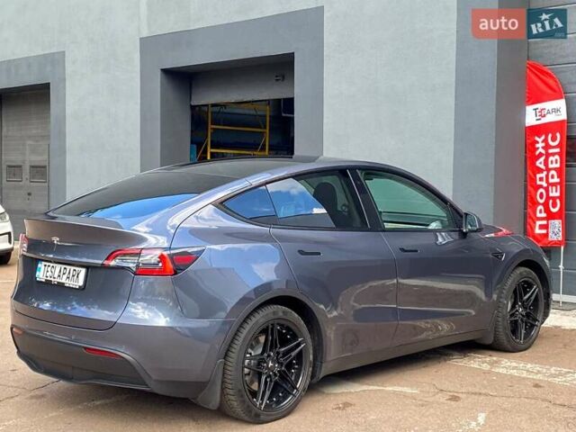 Серый Тесла Model Y, объемом двигателя 0 л и пробегом 123 тыс. км за 23999 $, фото 9 на Automoto.ua