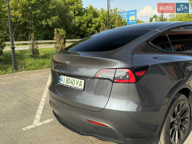 Серый Тесла Model Y, объемом двигателя 0 л и пробегом 104 тыс. км за 22500 $, фото 18 на Automoto.ua