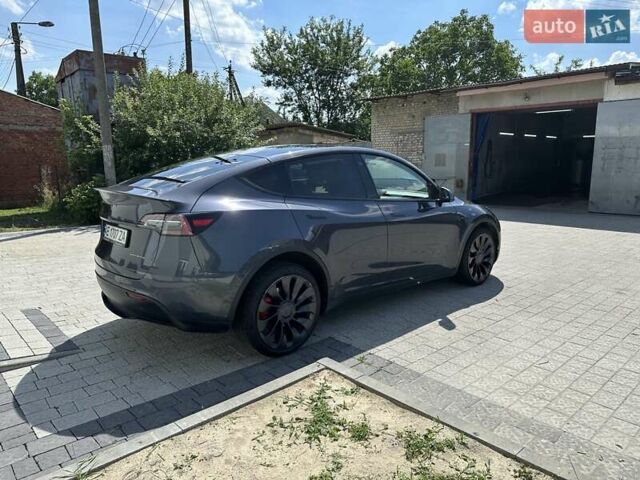 Серый Тесла Model Y, объемом двигателя 0 л и пробегом 58 тыс. км за 31900 $, фото 2 на Automoto.ua
