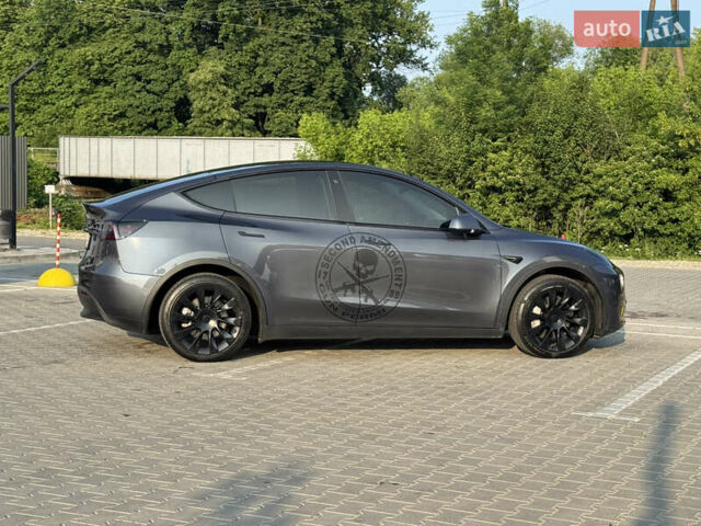 Серый Тесла Model Y, объемом двигателя 0 л и пробегом 79 тыс. км за 24300 $, фото 24 на Automoto.ua