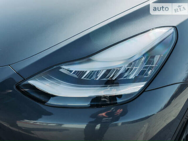 Серый Тесла Model Y, объемом двигателя 0 л и пробегом 52 тыс. км за 28200 $, фото 18 на Automoto.ua