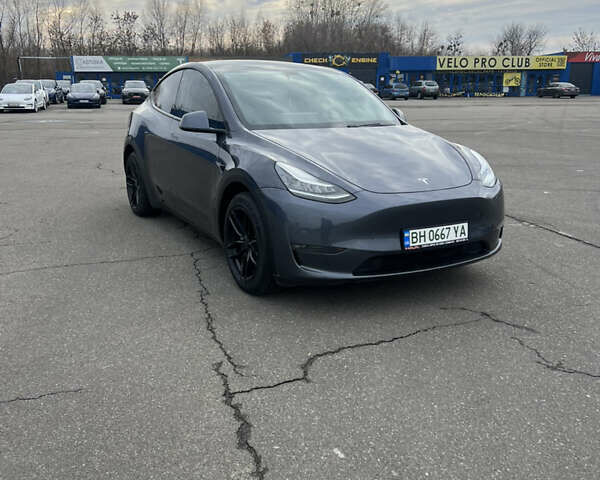 Серый Тесла Model Y, объемом двигателя 0 л и пробегом 99 тыс. км за 22300 $, фото 2 на Automoto.ua