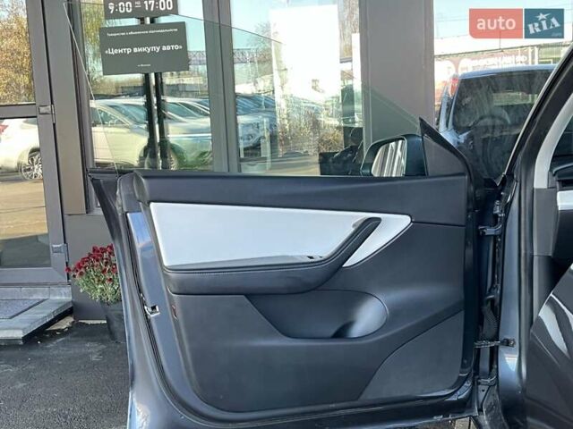 Сірий Тесла Model Y, об'ємом двигуна 0 л та пробігом 81 тис. км за 21499 $, фото 16 на Automoto.ua