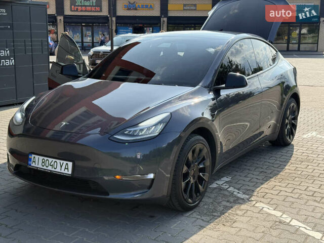 Серый Тесла Model Y, объемом двигателя 0 л и пробегом 104 тыс. км за 22500 $, фото 3 на Automoto.ua
