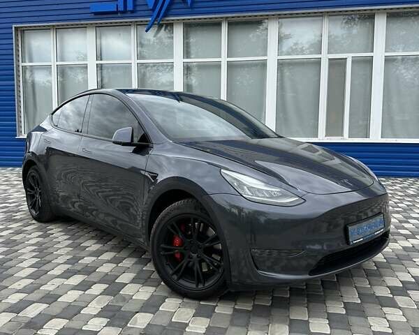 Серый Тесла Model Y, объемом двигателя 0 л и пробегом 77 тыс. км за 30555 $, фото 28 на Automoto.ua