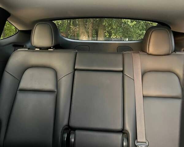 Серый Тесла Model Y, объемом двигателя 0 л и пробегом 52 тыс. км за 34000 $, фото 16 на Automoto.ua