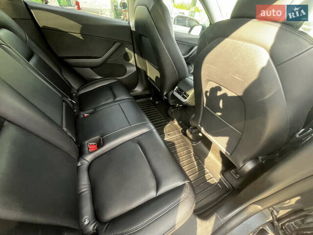 Серый Тесла Model Y, объемом двигателя 0 л и пробегом 137 тыс. км за 22900 $, фото 12 на Automoto.ua