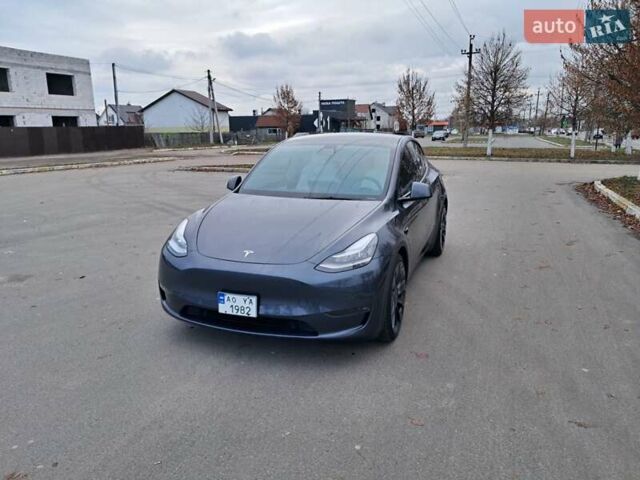 Серый Тесла Model Y, объемом двигателя 0 л и пробегом 100 тыс. км за 23500 $, фото 1 на Automoto.ua