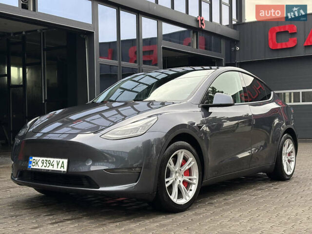 Серый Тесла Model Y, объемом двигателя 0 л и пробегом 92 тыс. км за 23500 $, фото 1 на Automoto.ua