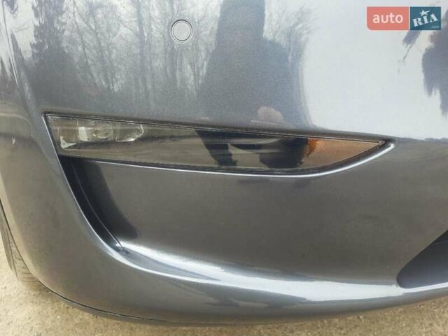 Серый Тесла Model Y, объемом двигателя 0 л и пробегом 48 тыс. км за 24900 $, фото 5 на Automoto.ua