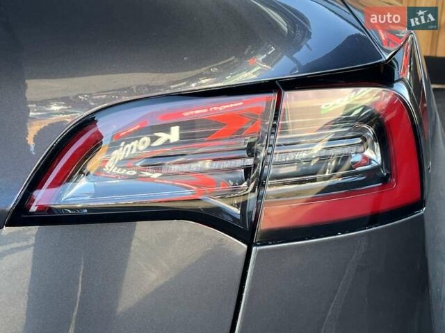 Серый Тесла Model Y, объемом двигателя 0 л и пробегом 81 тыс. км за 22099 $, фото 11 на Automoto.ua