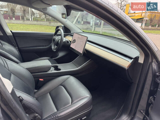 Серый Тесла Model Y, объемом двигателя 0 л и пробегом 170 тыс. км за 19500 $, фото 25 на Automoto.ua