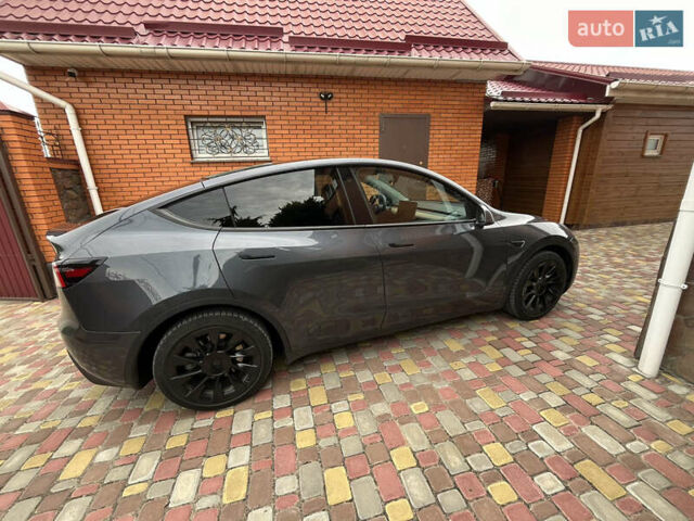 Серый Тесла Model Y, объемом двигателя 0 л и пробегом 41 тыс. км за 28500 $, фото 2 на Automoto.ua