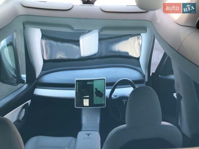 Серый Тесла Model Y, объемом двигателя 0 л и пробегом 81 тыс. км за 22099 $, фото 36 на Automoto.ua