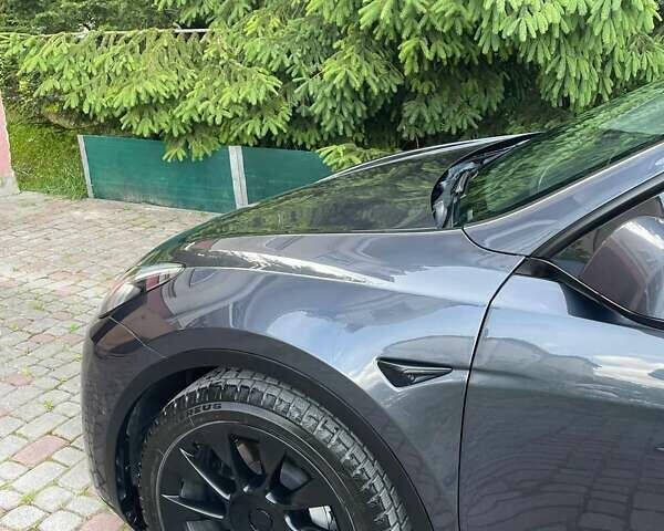 Серый Тесла Model Y, объемом двигателя 0 л и пробегом 83 тыс. км за 21499 $, фото 22 на Automoto.ua