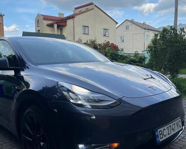 Серый Тесла Model Y, объемом двигателя 0 л и пробегом 83 тыс. км за 21499 $, фото 1 на Automoto.ua