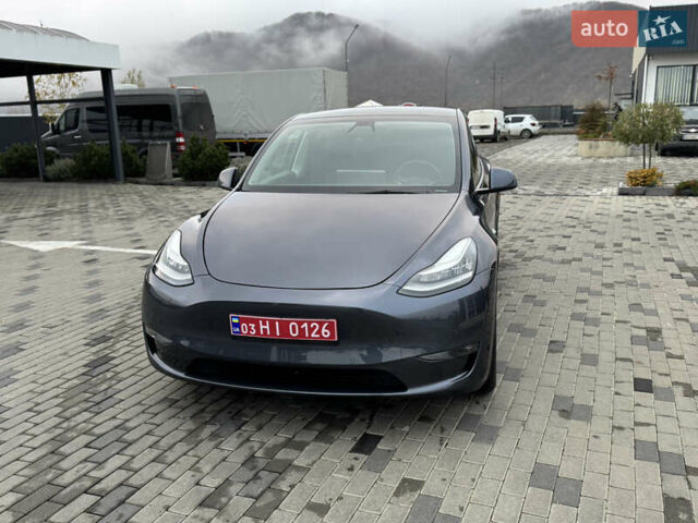 Серый Тесла Model Y, объемом двигателя 0 л и пробегом 128 тыс. км за 20300 $, фото 2 на Automoto.ua
