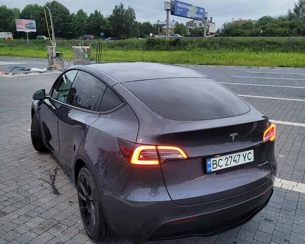 Серый Тесла Model Y, объемом двигателя 0 л и пробегом 83 тыс. км за 21499 $, фото 32 на Automoto.ua