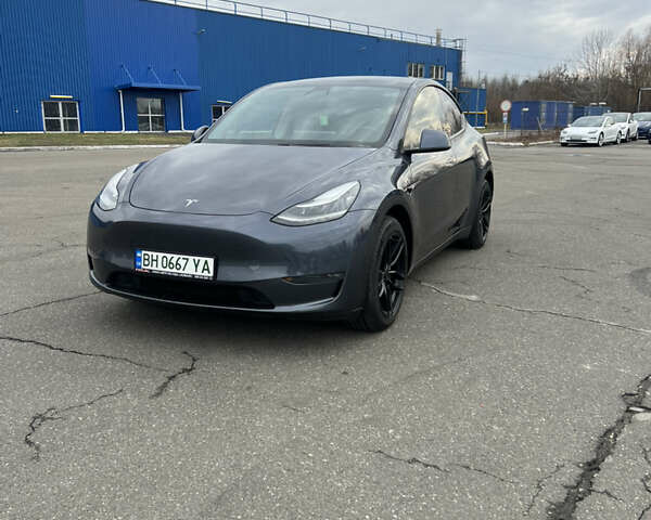 Серый Тесла Model Y, объемом двигателя 0 л и пробегом 99 тыс. км за 22300 $, фото 1 на Automoto.ua