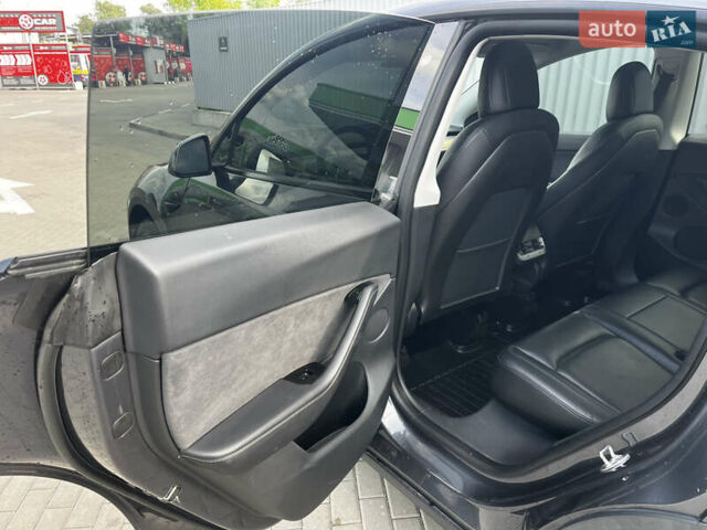 Серый Тесла Model Y, объемом двигателя 0 л и пробегом 137 тыс. км за 22900 $, фото 9 на Automoto.ua