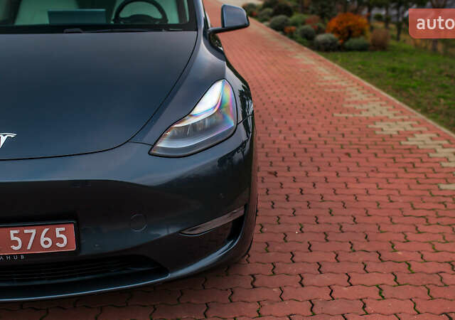 Сірий Тесла Model Y, об'ємом двигуна 0 л та пробігом 75 тис. км за 26499 $, фото 2 на Automoto.ua