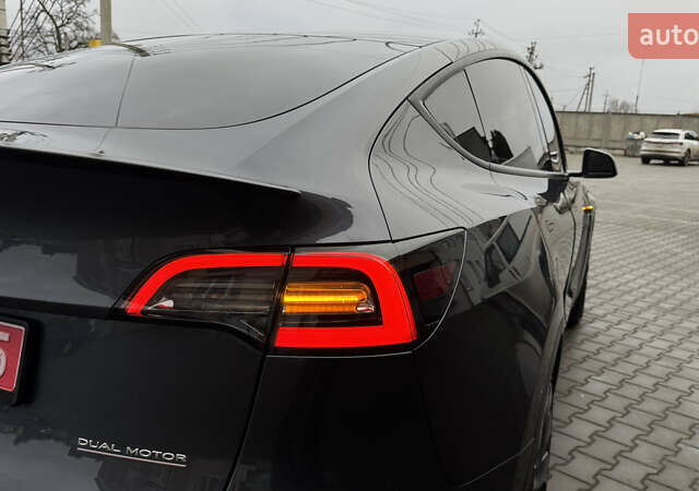 Серый Тесла Model Y, объемом двигателя 0 л и пробегом 138 тыс. км за 20200 $, фото 41 на Automoto.ua