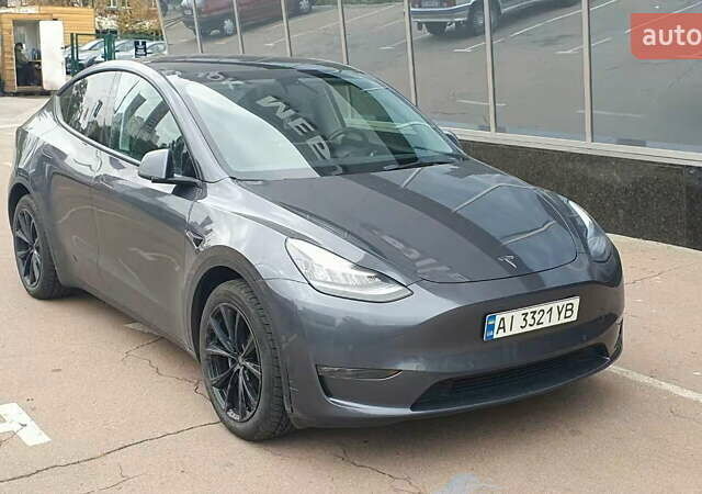 Серый Тесла Model Y, объемом двигателя 0 л и пробегом 84 тыс. км за 24999 $, фото 2 на Automoto.ua