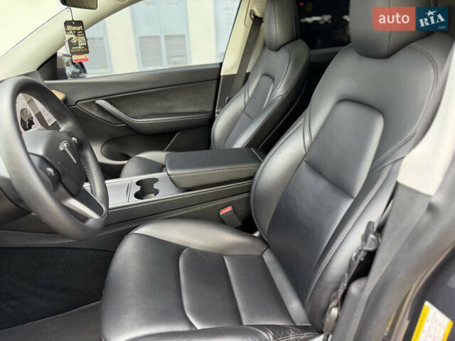 Серый Тесла Model Y, объемом двигателя 0 л и пробегом 42 тыс. км за 29900 $, фото 16 на Automoto.ua