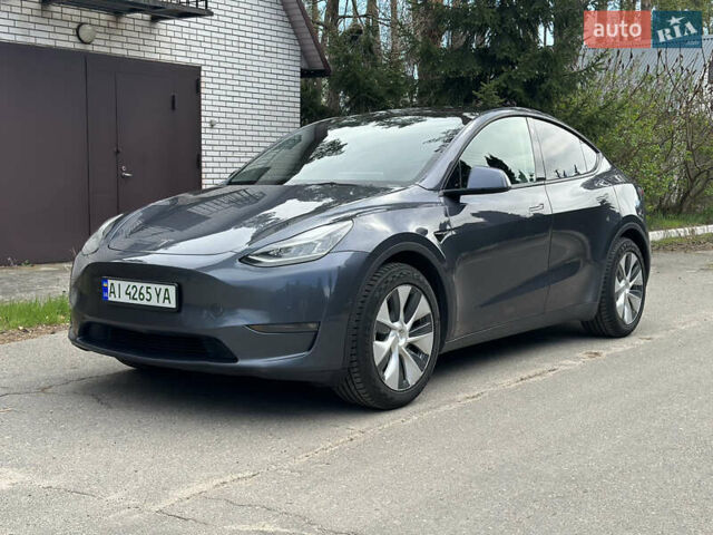 Серый Тесла Model Y, объемом двигателя 0 л и пробегом 88 тыс. км за 23500 $, фото 6 на Automoto.ua