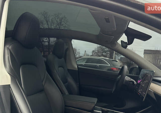 Серый Тесла Model Y, объемом двигателя 0 л и пробегом 138 тыс. км за 20200 $, фото 32 на Automoto.ua