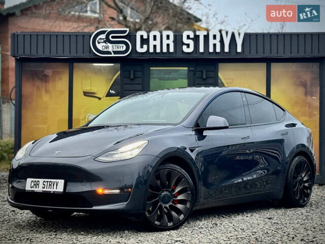 Серый Тесла Model Y, объемом двигателя 0 л и пробегом 107 тыс. км за 23999 $, фото 1 на Automoto.ua