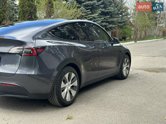 Серый Тесла Model Y, объемом двигателя 0 л и пробегом 88 тыс. км за 23500 $, фото 4 на Automoto.ua