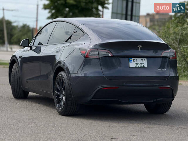 Серый Тесла Model Y, объемом двигателя 0 л и пробегом 91 тыс. км за 26500 $, фото 18 на Automoto.ua