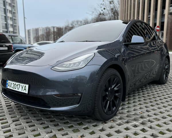 Серый Тесла Model Y, объемом двигателя 0 л и пробегом 22 тыс. км за 26900 $, фото 1 на Automoto.ua