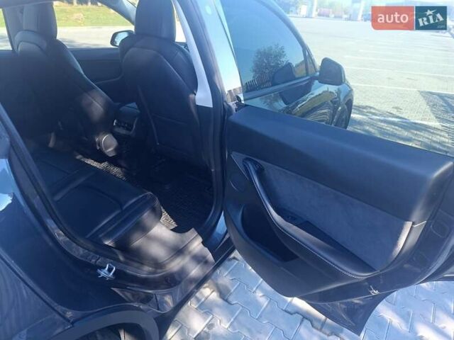 Серый Тесла Model Y, объемом двигателя 0 л и пробегом 29 тыс. км за 27500 $, фото 15 на Automoto.ua