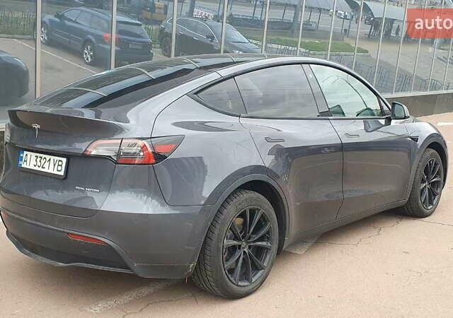Серый Тесла Model Y, объемом двигателя 0 л и пробегом 84 тыс. км за 24999 $, фото 10 на Automoto.ua