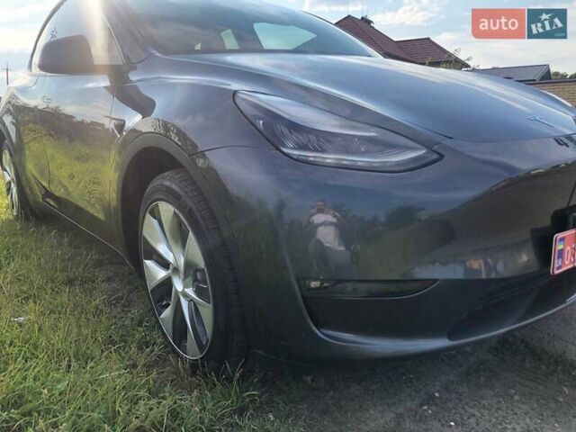 Серый Тесла Model Y, объемом двигателя 0 л и пробегом 77 тыс. км за 22700 $, фото 4 на Automoto.ua