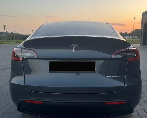 Серый Тесла Model Y, объемом двигателя 0 л и пробегом 28 тыс. км за 24500 $, фото 1 на Automoto.ua