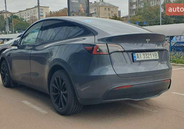 Серый Тесла Model Y, объемом двигателя 0 л и пробегом 84 тыс. км за 24999 $, фото 14 на Automoto.ua
