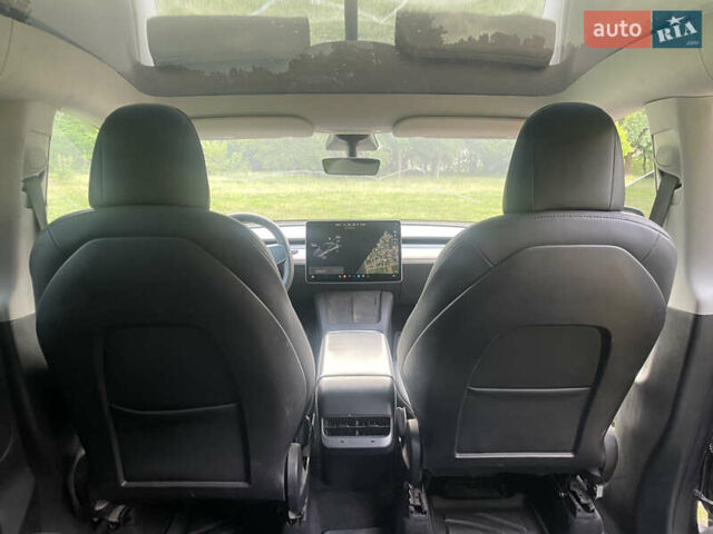 Серый Тесла Model Y, объемом двигателя 0 л и пробегом 75 тыс. км за 24500 $, фото 9 на Automoto.ua