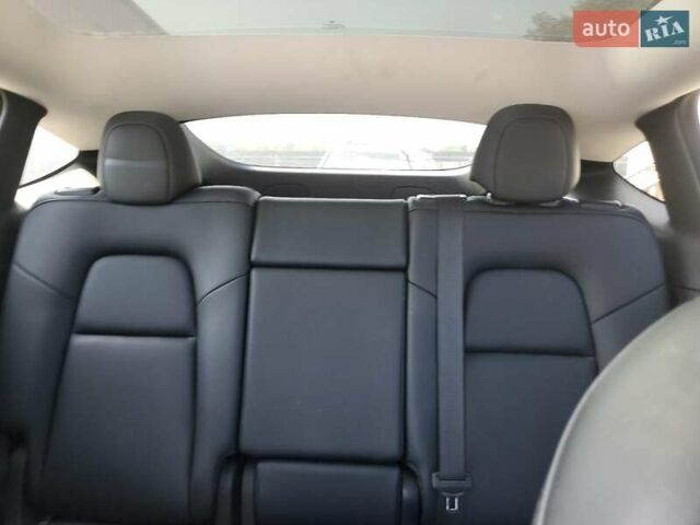 Серый Тесла Model Y, объемом двигателя 0 л и пробегом 81 тыс. км за 17500 $, фото 9 на Automoto.ua
