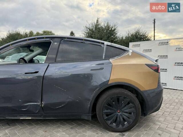 Серый Тесла Model Y, объемом двигателя 0 л и пробегом 102 тыс. км за 18200 $, фото 2 на Automoto.ua