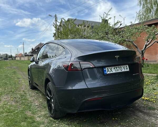 Серый Тесла Model Y, объемом двигателя 0 л и пробегом 28 тыс. км за 34900 $, фото 3 на Automoto.ua